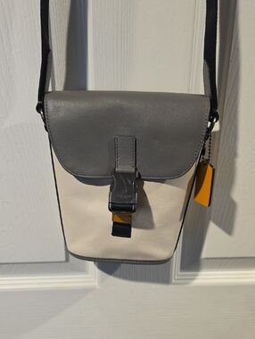 Coach Track Small Flap Crossbody, specifically in a colorblock leather design.